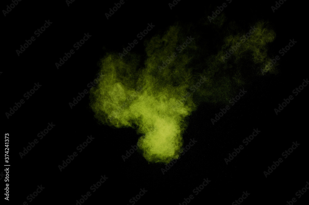 Light green powder explosion on black background. Colored powder cloud. Colorful dust explode. Paint Holi. Light green powder explosion on black background. Colored powder cloud. Colorful dust explode. Paint Holi.