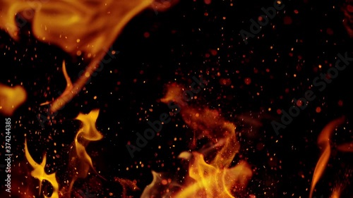 Fire flames with sparkles shooting on high speed camera at 1000fps, Isolated on black background. photo