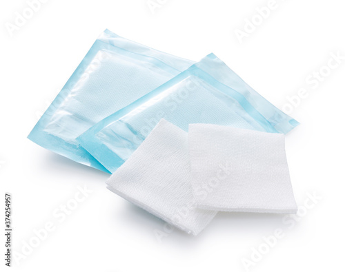 individually wrapped gauze on a white background