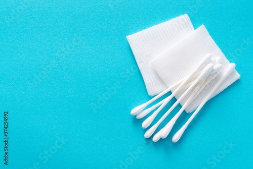 Swabs and gauze on a blue background