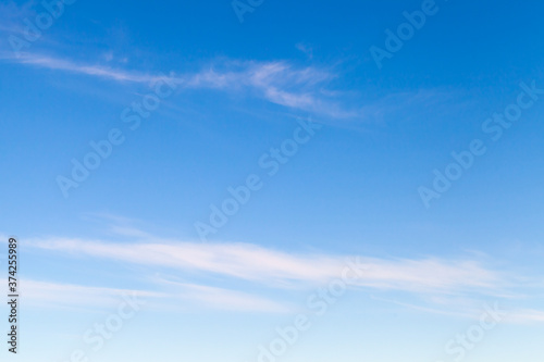 Fototapeta Naklejka Na Ścianę i Meble -  Blue sky with windy thin cirrus clouds at daytime