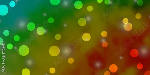 Light Blue, Green vector backdrop with circles, stars. Illustration with set of colorful abstract spheres, stars. Pattern for websites.