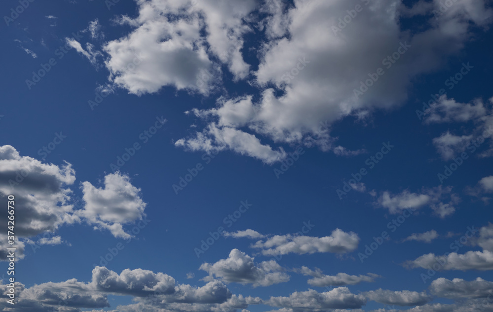 Blue sky and a beautiful cloud with a meadow tree. Normal landscape background for a summer poster. The best view for recreation. Blue sky and a beautiful cloud with a meadow tree. Normal landscape background for a summer poster. The best view for recreation.