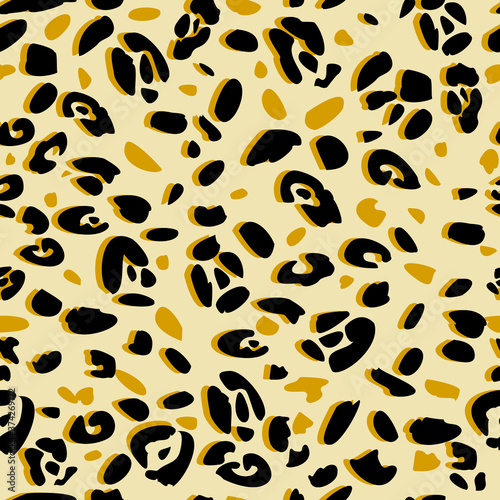 Abstract seamless patterns of leopard skin. black and orange spots of the wrong brush on a gray background. Abstract print of the skin of wild animals. Simple modern fashion design
