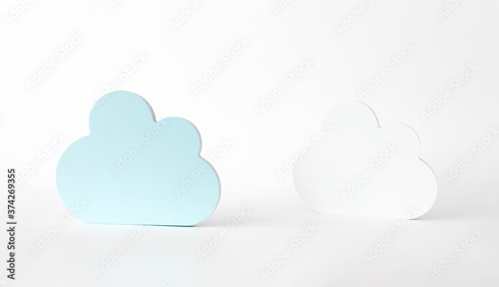 Cloud shape decor on white background. Minimalistic composition for showcase, product presentation with copy space. Scene stage for new product, promotion sale, cosmetic