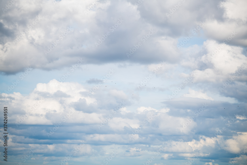 white cumulus clouds in the blue sky white cumulus clouds in the blue sky