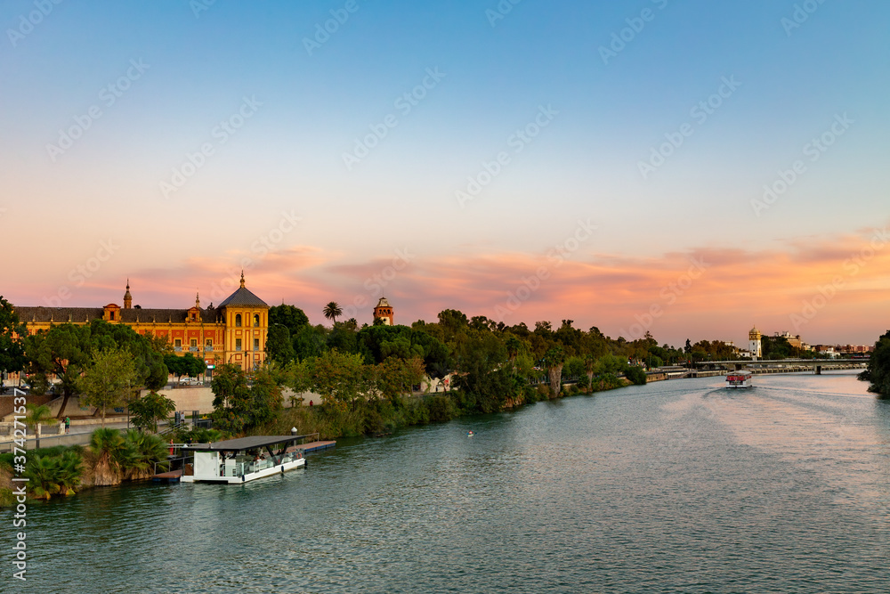Sunset over the Guadalquivir river in Seville, Andalucia, Spain.