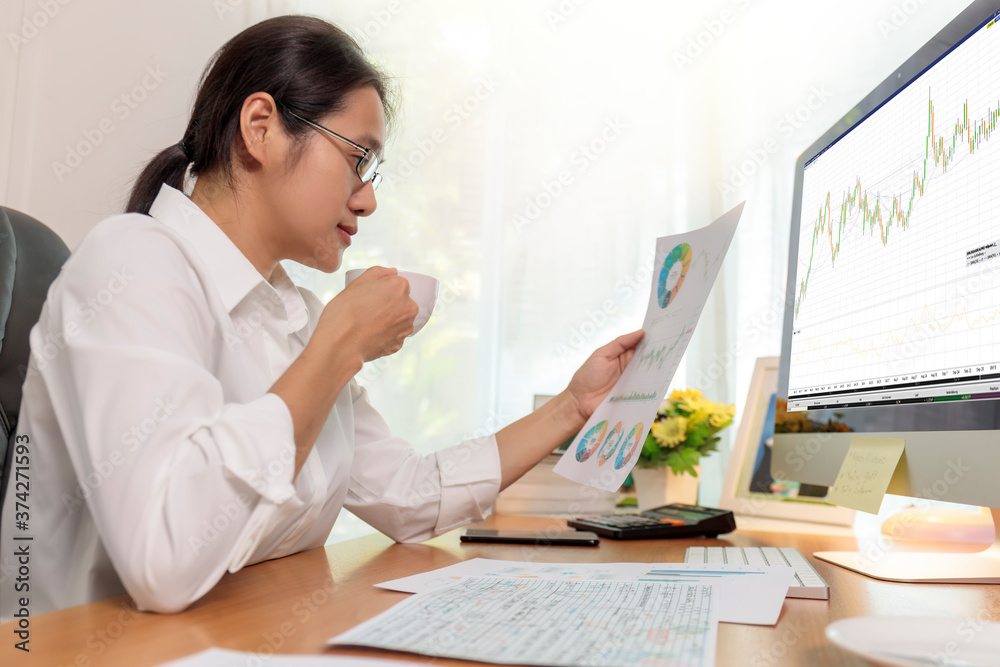 Asian business women working at home online meeting with video conference on computer. Business people using computer online meeting and speaking with team group. Asian business women working at home online meeting with video conference on computer. Business people using computer online meeting and speaking with team group.