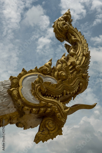 golden great Naga statue in thailand