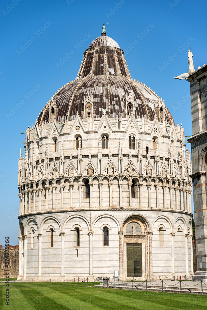 Pisa, Baptistery of St. John (Battistero di San Giovanni) in Romanesque Gothic style, Piazza or Campo dei Miracoli (Square of Miracles). Tuscany, Italy, Europe