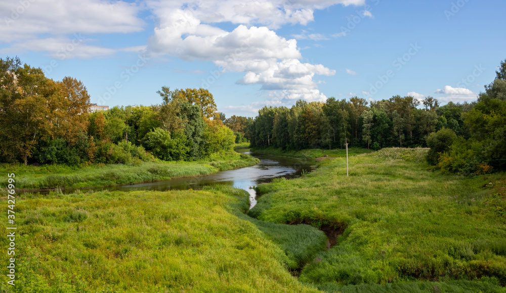 Landscape with forest,stream and river ahead. beautiful scenery Landscape with forest,stream and river ahead. beautiful scenery