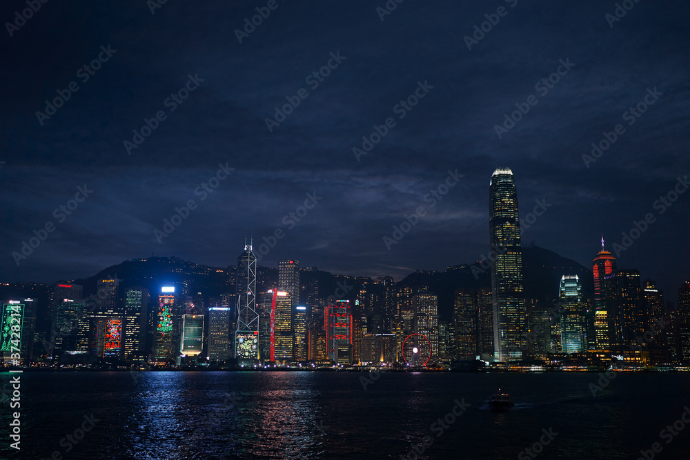 Central business district  Hong Kong with a sunset dawn sky above the harbour at night time. The 11th of December 2017.