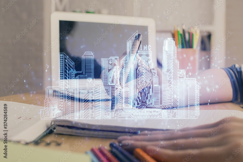 IOT drawing over writing hands in notepad background. Concept of smart home. Multi exposure IOT drawing over writing hands in notepad background. Concept of smart home. Multi exposure