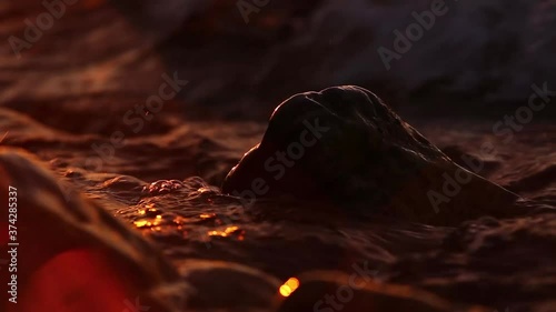 Water splash on stone surface on evening Baikal lake background