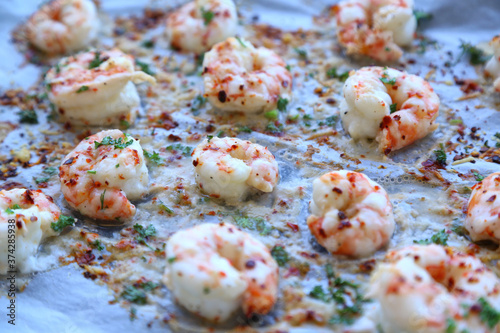 shrimps with parmesan ready to be cooked baked