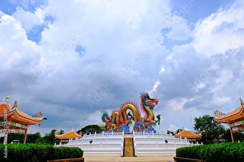 Golden dancing dragon at Suan Sawan, Sawan Park or Paradise Park in Nakhon Sawan Province, Thailand.
