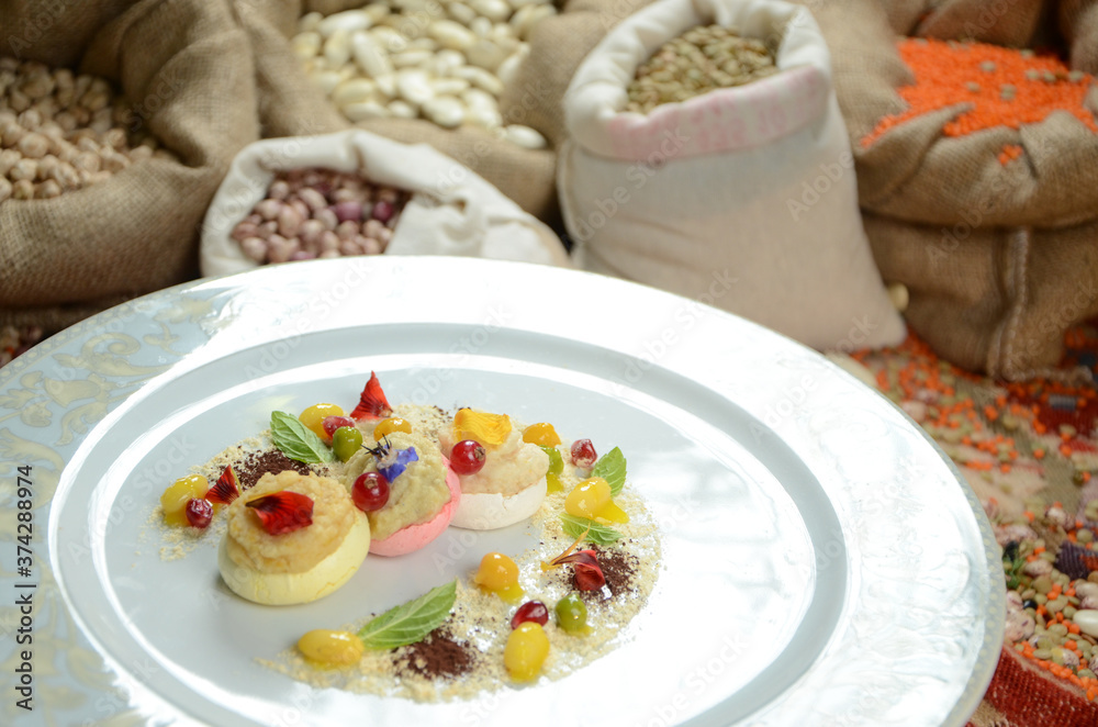 turkish traditional dessert in front of legume family sacks