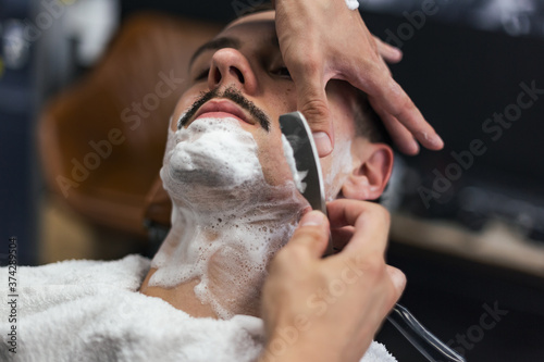Bild auf Leinwand Man mith mustaches having a shave