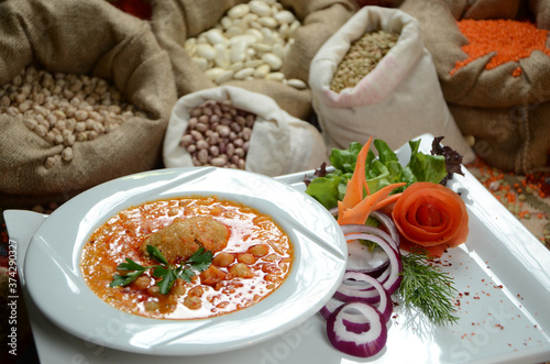 traditional turkish ottoman food in front of legume family sacks