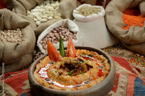 traditional turkish ottoman food in front of legume family sacks