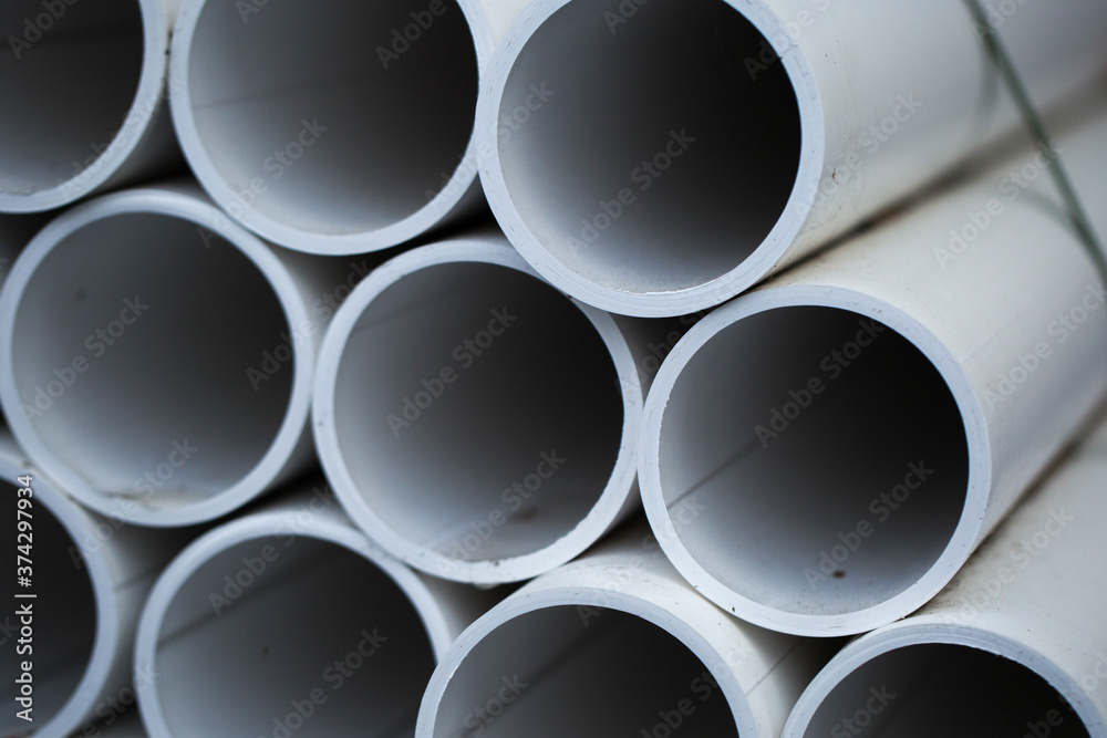 Stacked plastic pipes for storage Stacked plastic pipes for storage