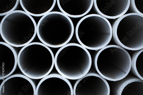 Stacked plastic pipes for storage