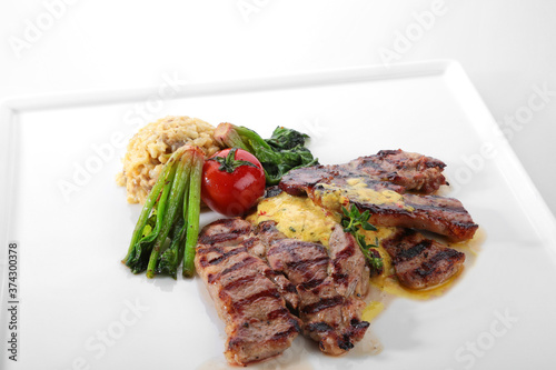 grilled lamb steak gourmet dish white background
