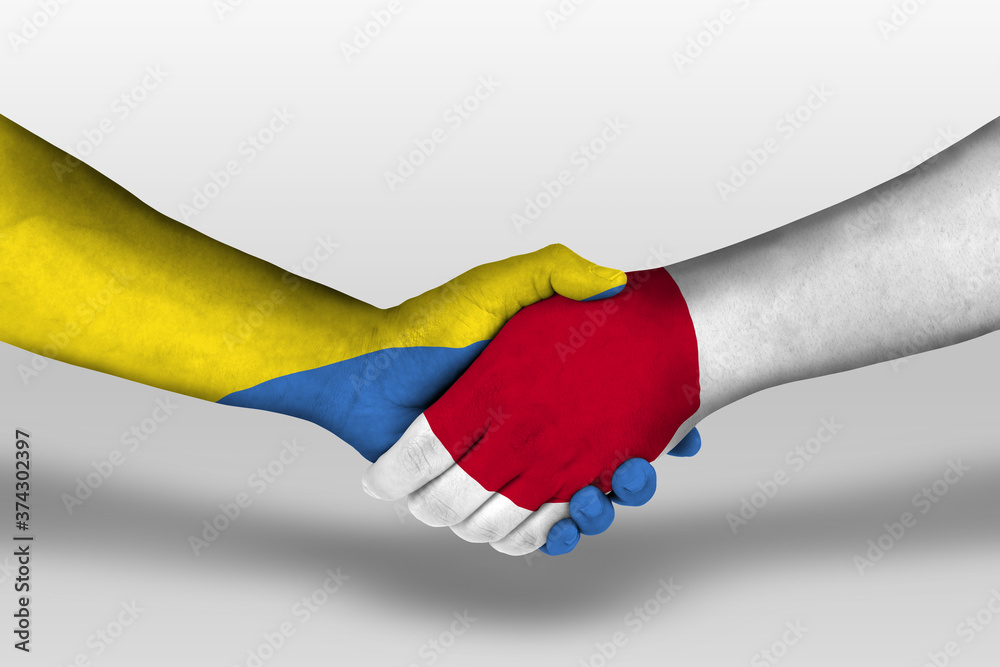 Handshake between japan and ukraine flags painted on hands, illustration with clipping path.