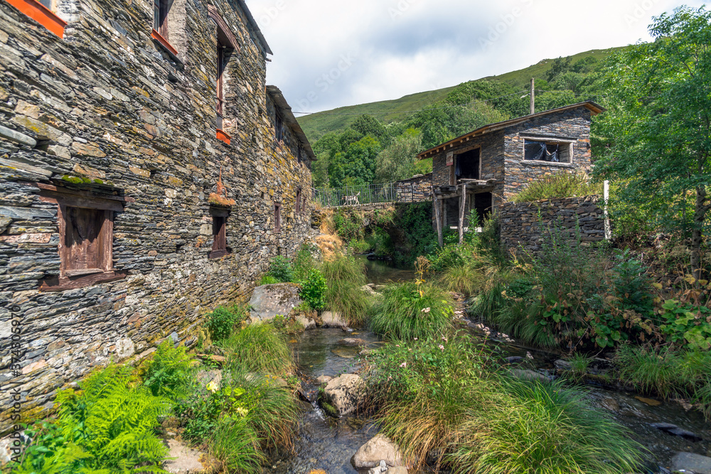 A Seara, Galicia / Spain - August 11, 2020: River Selmo through the village