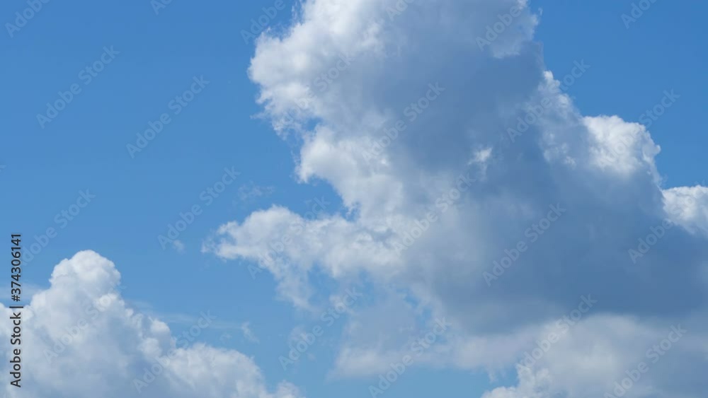 Blue sky white clouds. Puffy fluffy white clouds timelapse. Summer blue sky time lapse. Blue sky white clouds. Puffy fluffy white clouds timelapse. Summer blue sky time lapse.
