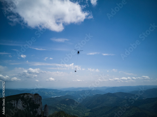 helicopter over mountains