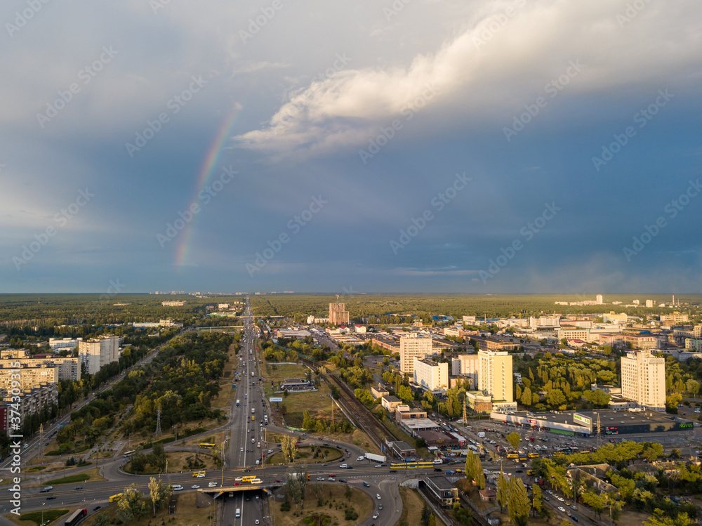 Obraz premium Aerial drone view. Rainbow over a residential area of Kiev.