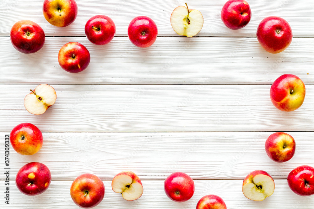 Frame of red apples on kitchen table top view Frame of red apples on kitchen table top view