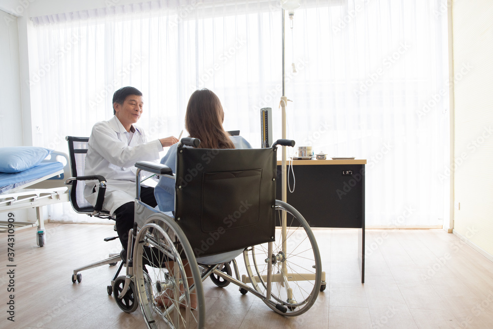 Doctor And Patient Discussing While Sitting At Hospital Doctor And Patient Discussing While Sitting At Hospital