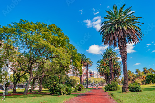 Cityscape of modern and old Buenos Aires with business and living in Palermo district, beautiful nature, parks and traditional cultural architecture at sunny day and blue sky, Argentina, summer © neurobite
