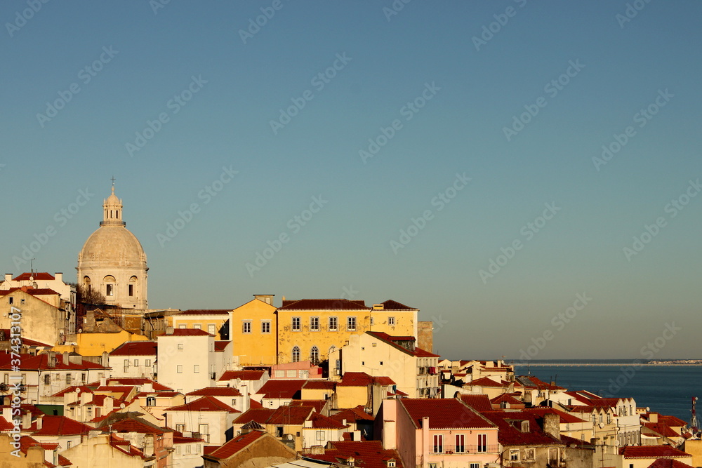 View of Alfama neighborhood and the National Pantheon in Lisbon from Miradouro de Santa Luzia viewpoint, Portugal