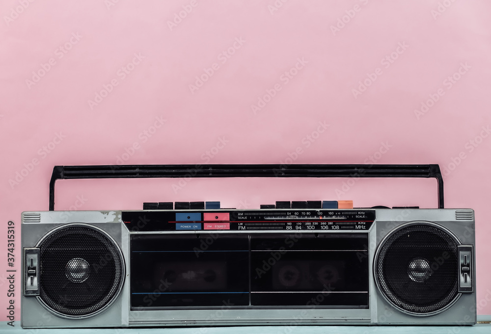 80s Retro outdated portable stereo radio cassette Recorder on pink pastel  background. Stock-Foto | Adobe Stock