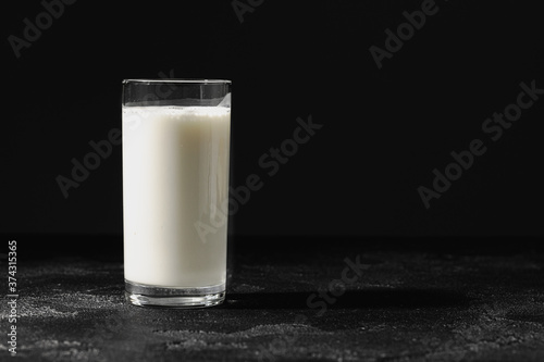 Fotografie, Obraz Glass of milk on table close up