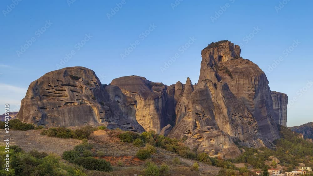 Timelapse 4k, Incredible sunset view of Meteora rock formation and Activities in evening city of Kalabaka, UNESCO World Heritage since 1988, Meteora, City Kastraki, Greece. Timelapse 4k, Incredible sunset view of Meteora rock formation and Activities in evening city of Kalabaka, UNESCO World Heritage since 1988, Meteora, City Kastraki, Greece.
