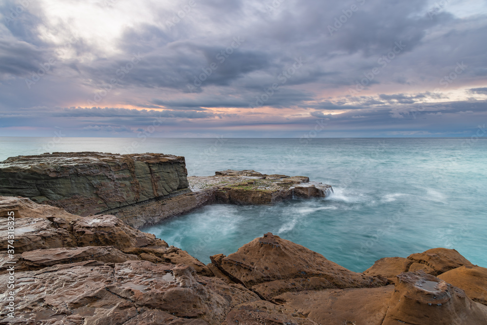 Obraz premium After the Rain Coastal Sunrise Seascape
