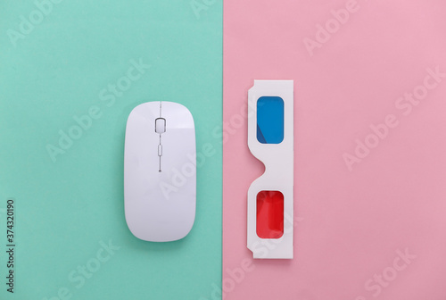 Tableau sur toile PC mouse and anaglyph 3D glasses on pink blue pastel background