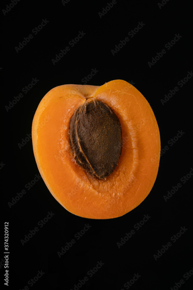 Abricot on black background Abricot on black background