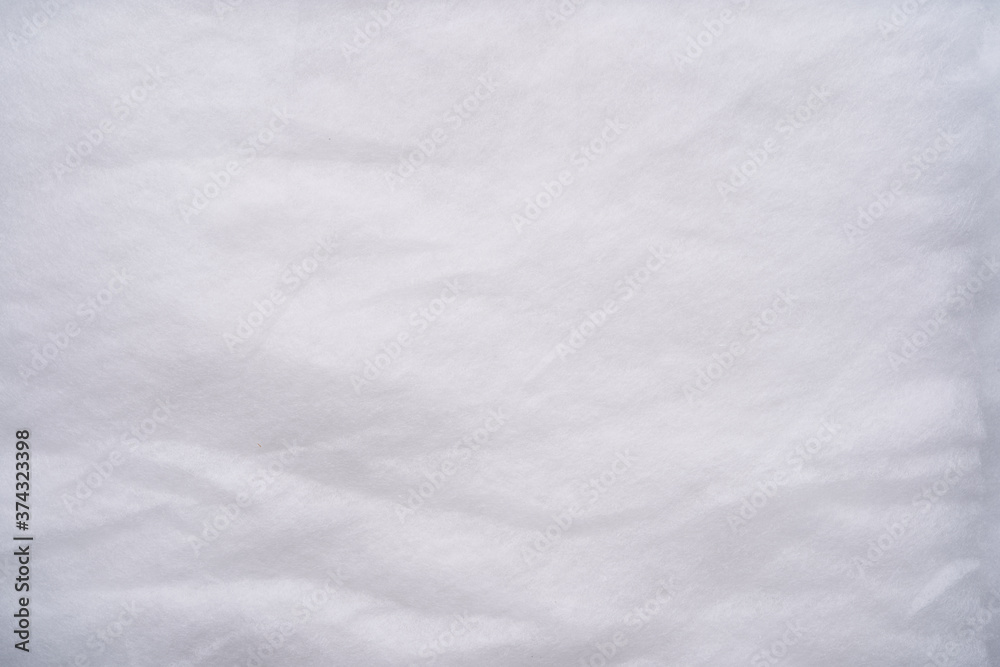 Obraz premium A top view of a texture background of soft warm synthetic fluffy microfibre material.
