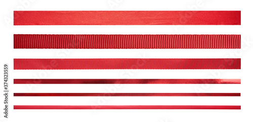 Obraz na płótnie A set of straight red ribbons of different sizes and designs for Christmas and valentines day present wrapping isolated against a white background w salonie