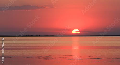 red sunset over sea water