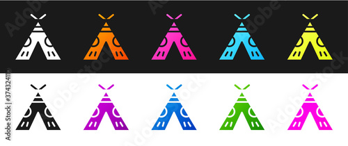 Set Traditional indian teepee or wigwam icon isolated on black and white background. Indian tent. Vector Illustration.