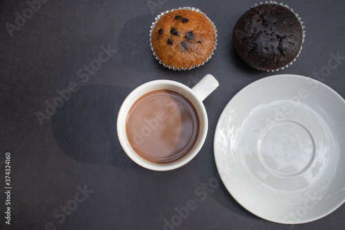 cup of coffee with chocolate cupcakes