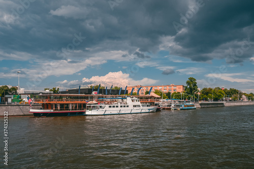 Marina with ships on the Moscow river. White ships on the Moscow river. Beautiful tourist destination in Moscow