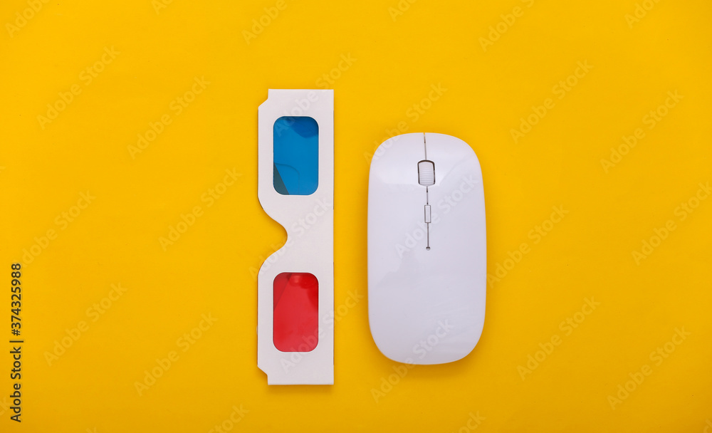Pc mouse with anaglyph 3d glasses on yellow background. Entertainment. Top view Pc mouse with anaglyph 3d glasses on yellow background. Entertainment. Top view