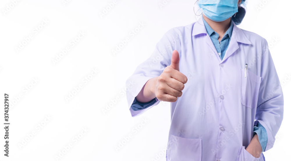 Professional young woman doctor wear uniform coat and mask with stethoscope while showing thumb up for good job over isolated white background. Healthy care and medical concept. Professional young woman doctor wear uniform coat and mask with stethoscope while showing thumb up for good job over isolated white background. Healthy care and medical concept.